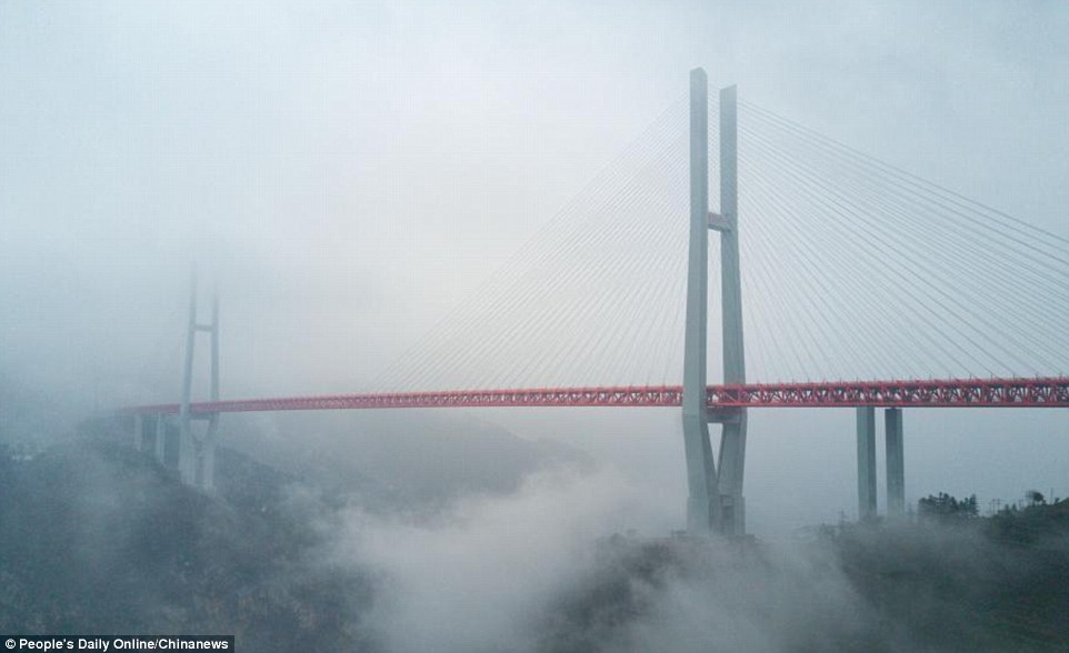 Dizzying height: The Bridge, reportedly cost 1.023 billion yuan (£120 million) to build, is hailed to be the highest in the world