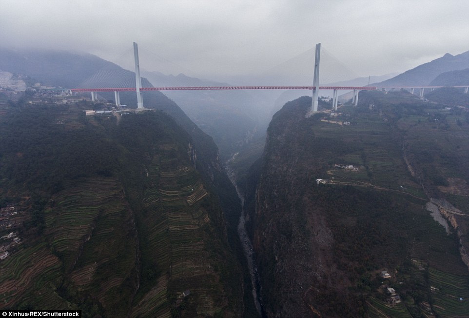 Highest bridge: The vertigo-inducing Beipanjiang bridge, opened today, is built over a deep gorge in south-west China