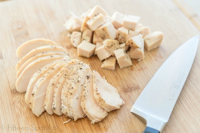Crockpot Chicken Breast for tacos, rice, salads, and more on a cutting board